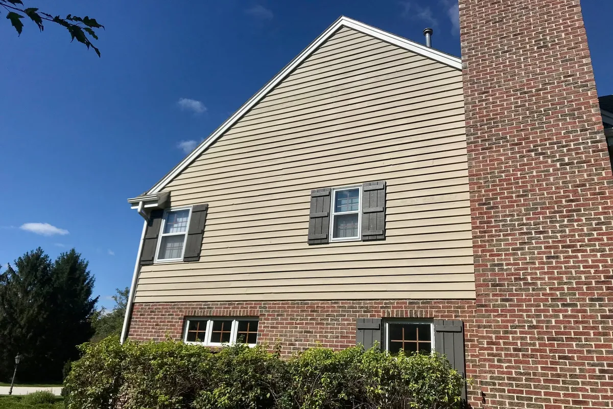 Back of a home with new paint and masonry