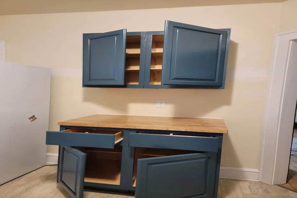 Cabinets refinished with blue and green mix paint