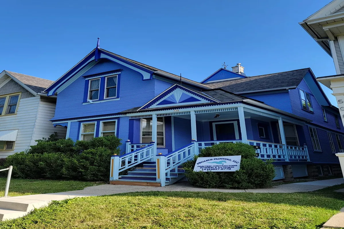 Home with bright blue exterior paint